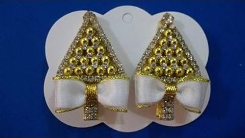 Árvore de natal com pérolas e strass no bico de pato