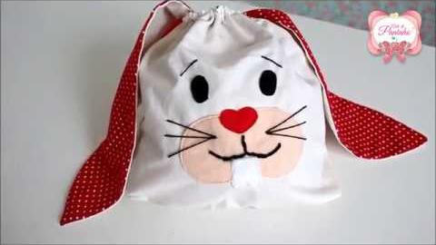 Saco para bombons com formato de coelhinho