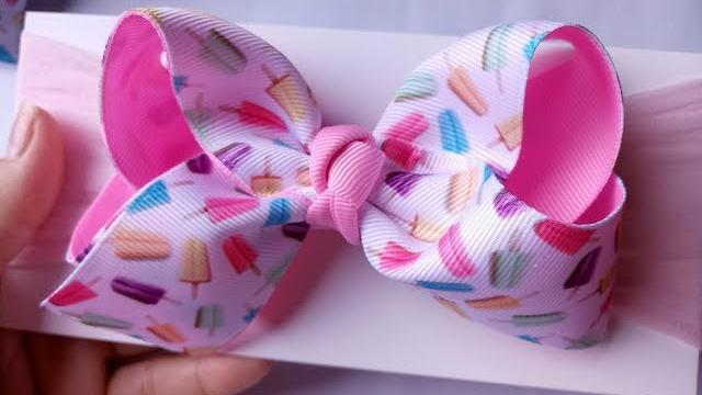 LAÇO BOUTIQUE COM PONTA na faixa larga para bebês